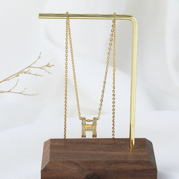 Wholesale Simple Classic Letter H Titanium Steel Necklace With Gold Inlaid Design
