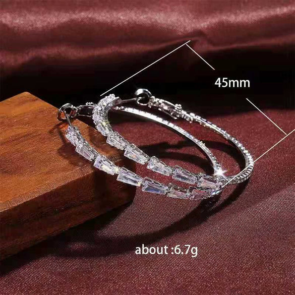 Wholesale Simple Exaggerated Large Circle Microinlaid Zircon Copper Earrings With Constellation Pattern And Electroplating Treatment For Children