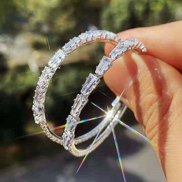Wholesale Simple Exaggerated Large Circle Microinlaid Zircon Copper Earrings With Constellation Pattern And Electroplating Treatment For Children
