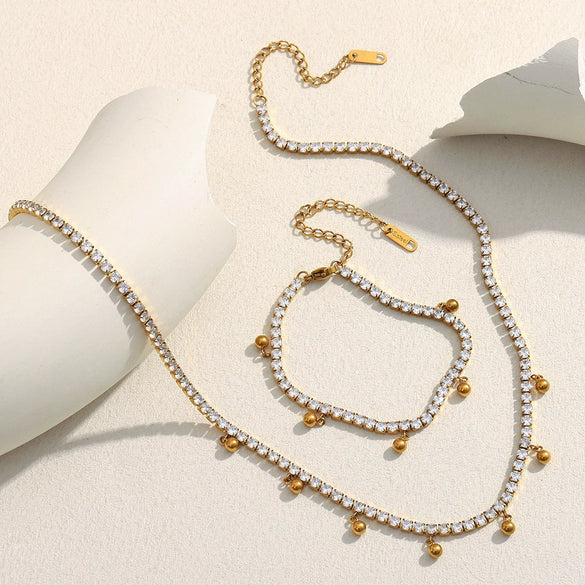 Wholesale Simple Geometric Stainless Steel And Titanium Steel 18K Gold Plated Zircon Ball Tassel Necklace And Bracelet Set For Women