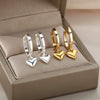 Wholesale Simple Heart Shaped Copper Earrings With 18K Gold Plated Zircon And Five Pointed Star Design Electroplated