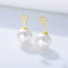 Wholesale Simple Heartshaped Diamondset Pearl Earrings For Women Made Of 925 Sterling Silver