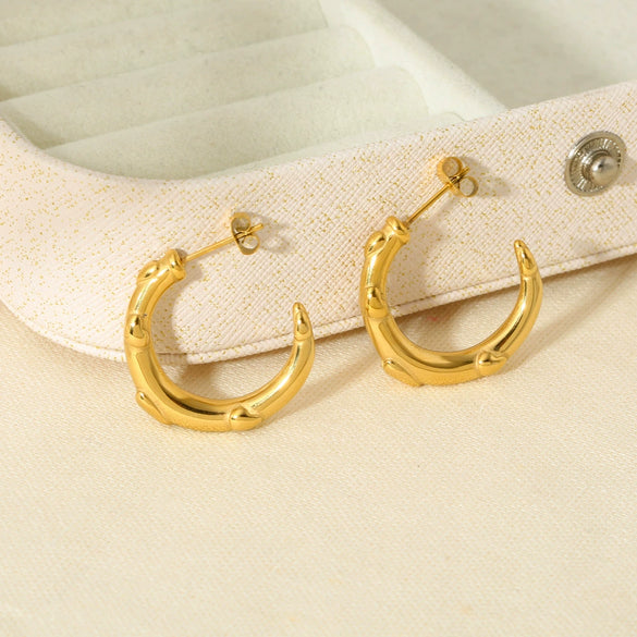 Wholesale Simple Modern Style Heartshaped Embossed Cshaped Stainless Steel Electroplated 18K Nonfading Gold Earrings For Women