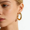 Wholesale Simple Modern Style Heartshaped Embossed Cshaped Stainless Steel Electroplated 18K Nonfading Gold Earrings For Women