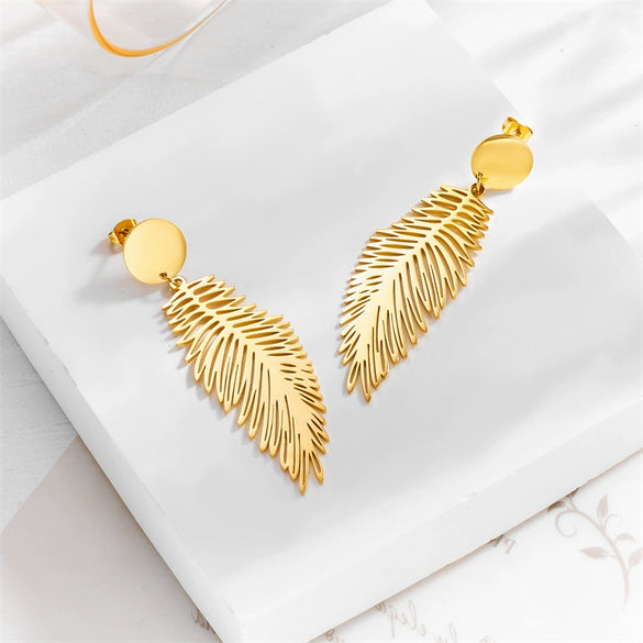 Wholesale Simple Retro Cold Style Titanium Steel Long Exaggerated Feather Pendant Earrings With Geometric Pattern And Electroplating Treatment