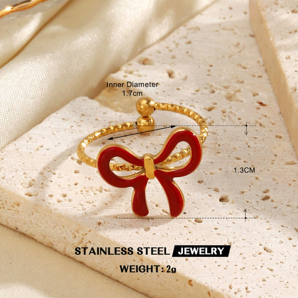 Wholesale Simple Style Stainless Steel Red Oil Dropping Love And Bow Ring With Electroplating Geometric And Heart Shape For Ladies And Unisex