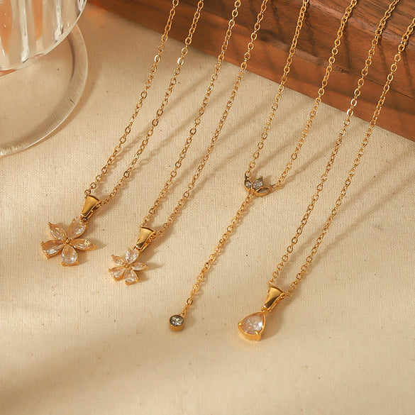 Wholesale Stainless Steel And Titanium Steel Flower Pendant Necklace With Electroplating And Diamondembedded Design