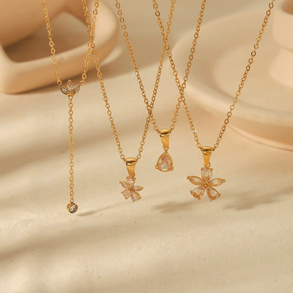 Wholesale Stainless Steel And Titanium Steel Flower Pendant Necklace With Electroplating And Diamondembedded Design