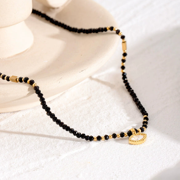 Wholesale Stainless Steel And Titanium Steel Geometric Hollow Bead Pendant Necklace For Women With Electroplating Design