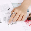 Wholesale Stainless Steel And Titanium Steel Geometric Zircon Women's Ring With Fourclaw Design And Electroplating