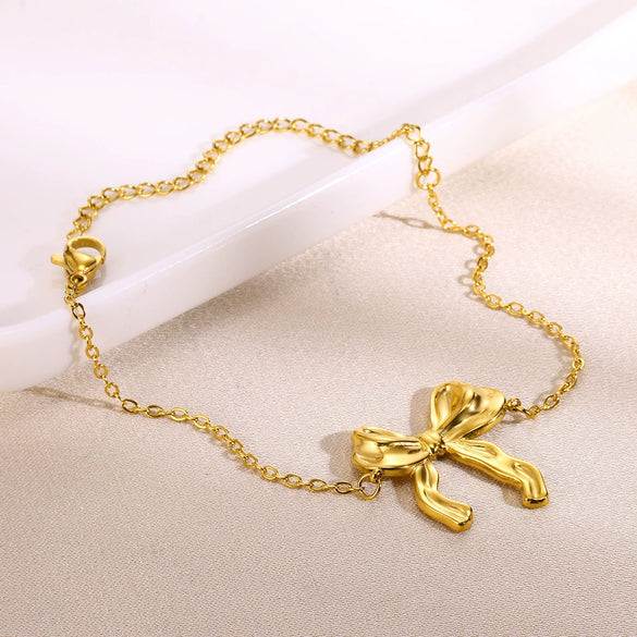 Wholesale Stainless Steel Bow Earrings And Clavicle Chain Set With 18K Gold Electroplating For Women