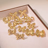 Wholesale Stainless Steel Bow Earrings With Simple Design And Polish Finish For Women