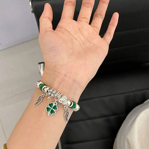 Wholesale Stainless Steel Electroplated Angel Wings Fourleaf Clover Pendant Beaded Bracelet With High Sense Design