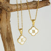 Wholesale 316L Stainless Steel Fourleaf Clover Pendant Necklace With Electroplating Treatment And Letter Pattern For Women