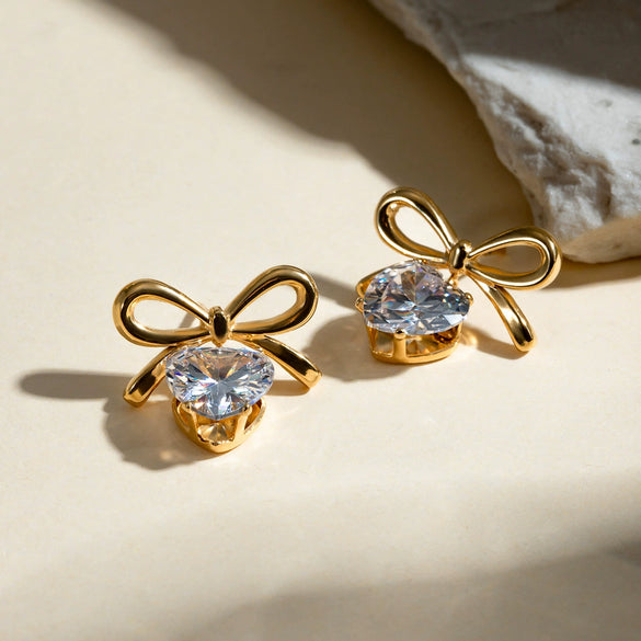 Wholesale Stainless Steel Geometric Bow Earrings With White Zircon And Electroplating
