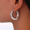 Wholesale Stainless Steel Geometric Dot Hammer Pattern Electroplated Ushaped Cut Out Asymmetrical Earrings For Women
