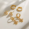 Wholesale Stainless Steel Geometric Electroplating Women's Zircon Four Awn Star And Cross Earrings