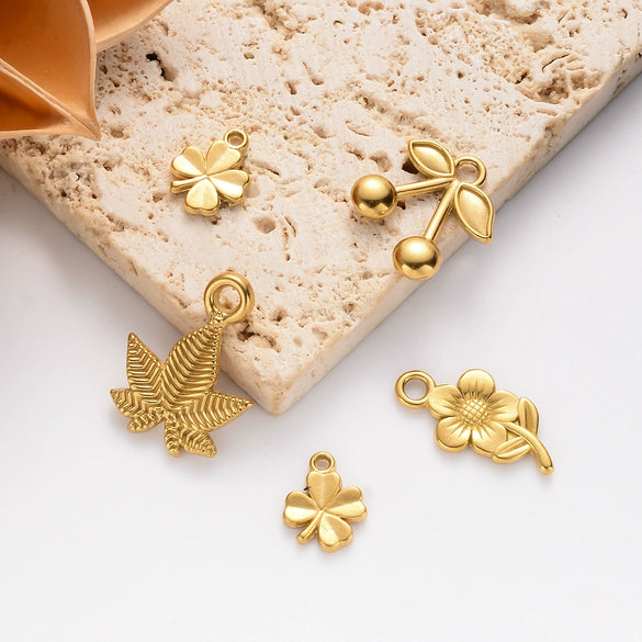 Wholesale Stainless Steel Jewelry Pendant With Sunflower Cherry Maple Leaf Lucky Grass Shapes And Electroplating Treatment