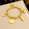 Wholesale Stainless Steel Jewelry Women's Bracelet With Goldplated Retro Fashion Round Plate Wave Conch Fish Tail Pendant And Animal Zodiac Pattern