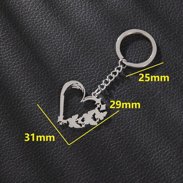 Wholesale Stainless Steel Keychain With Geometric Round Volleyball Football And Animal Bear Little Pig Pendants Electroplated