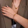 Wholesale Stainless Steel Metal Ball And Cross Necklace And Bracelet Set With 18K Vacuum Plating