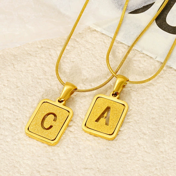 Wholesale Stainless Steel Necklace With Electroplating 26 Letters Pendant And New Sand Pressing Process Snake Chain Design