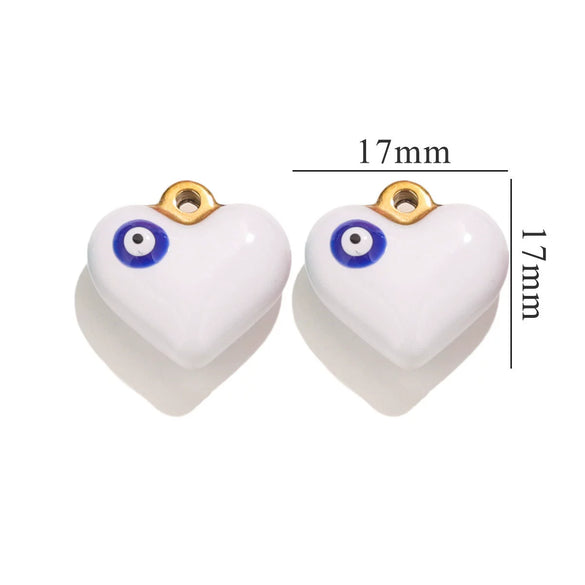 Wholesale Stainless Steel Niche Style Love Earrings With Peach Heart Pendant And Dripping Oil Design