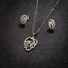 Wholesale Stainless Steel Plant Flower Palm Leaf Pendant Earrings Three Piece Set With Electroplating For Women Autumn And Winter 2024