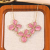 Wholesale Stainless Steel Plants And Flowers Dripping Oil Style Necklace And Earrings Set For Women