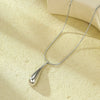 Wholesale Stainless Steel Retro Exaggerated Water Drop Cut Out Pendant Necklace With 18K Gold Electroplated Clavicle Chain For Women