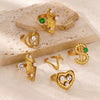 Wholesale Stainless Steel Ring For Women With Green Zircon Electroplated In Exaggerated Retro Style And Wave Pattern
