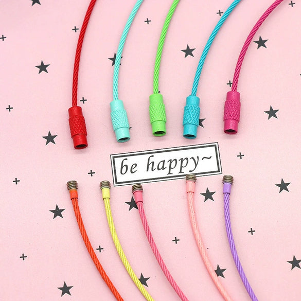 Wholesale Stainless Steel Rotating Key Ring Key Chain With Baking Paint And Geometric Style