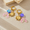 Wholesale Stainless Steel Round Earrings With Goldplated Star Moon Sun Pendant In Simple Style