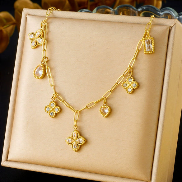 Wholesale Stainless Steel Women's Light Luxury Diamond Water Drop Fourpetal Flower Pendant Collarbone Necklace With Rhinestones And Electroplating