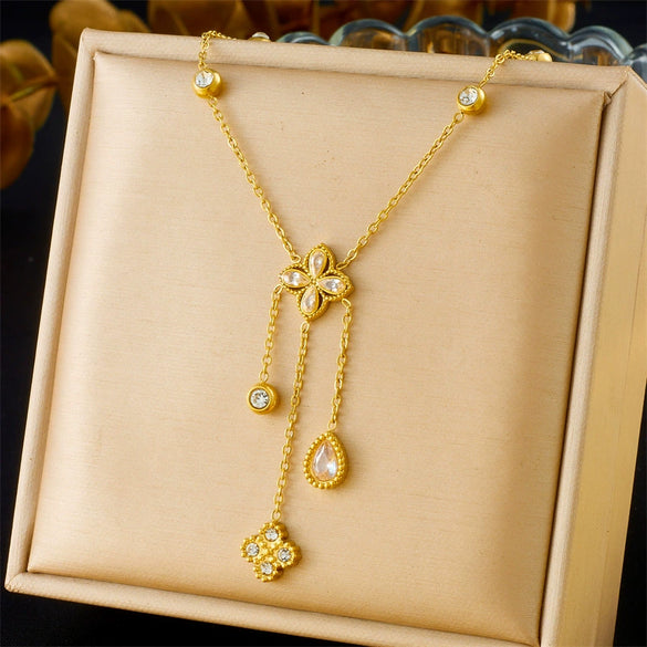 Wholesale Stainless Steel Women's Light Luxury Diamond Water Drop Fourpetal Flower Pendant Collarbone Necklace With Rhinestones And Electroplating