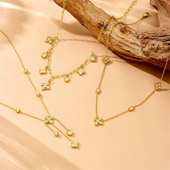 Wholesale Stainless Steel Women's Light Luxury Diamond Water Drop Fourpetal Flower Pendant Collarbone Necklace With Rhinestones And Electroplating