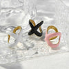 Wholesale Stainless Steel Xshaped Open Ring With Oil Dropping Pattern And Electroplating Treatment