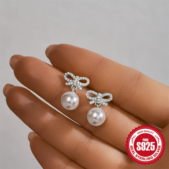 Wholesale 925 Sterling Silver Geometric Bow Pearl Women's Stud Earrings With Electroplating