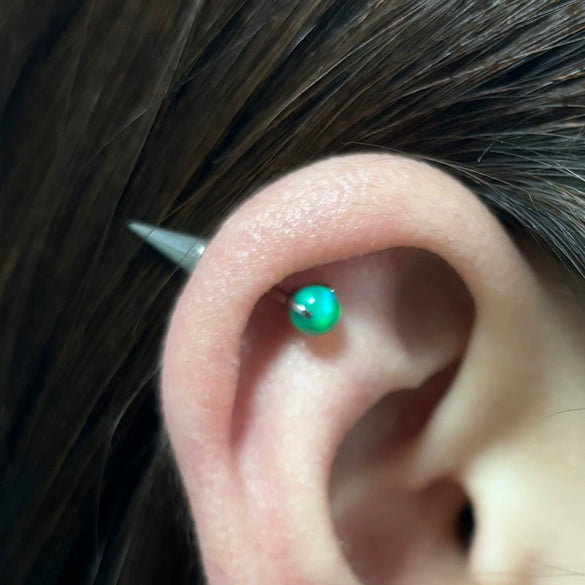 Wholesale Titanium Alloy Inlaid Gem Geometric Style Pointed Cone Ear Nail For Unisex
