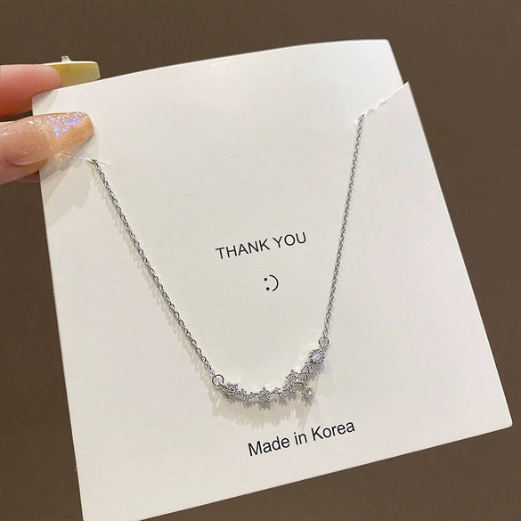 Wholesale Titanium Steel And Alloy Small Flower Pendant Necklace With Diamond Design For Women