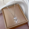 Wholesale Titanium Steel And Copper Diamondencrusted Geometric Fourleaf Flower Women's Necklace