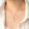 Wholesale Titanium Steel And Copper Ginkgo Biloba And Oval Inlaid Pearl Pendant Necklace For Women With Electroplating Design
