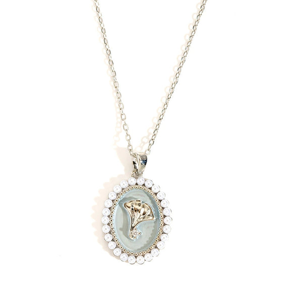 Wholesale Titanium Steel And Copper Ginkgo Biloba And Oval Inlaid Pearl Pendant Necklace For Women With Electroplating Design