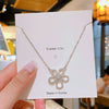 Wholesale Titanium Steel And Copper Women's Flower Pendant Necklace With Diamond Design