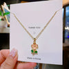 Wholesale Titanium Steel And Copper Women's Minimalist Geometric And Small Flower Pendant Necklace With Electroplating And Cross Chain