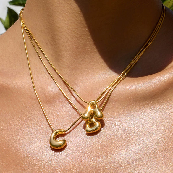 Wholesale Titanium Steel And Stainless Steel Electroplated Geometric Bubble Letter Necklace For Women