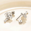 Wholesale Titanium Steel Animals Puppy Bone Style Women's Ear Nails With Electroplating