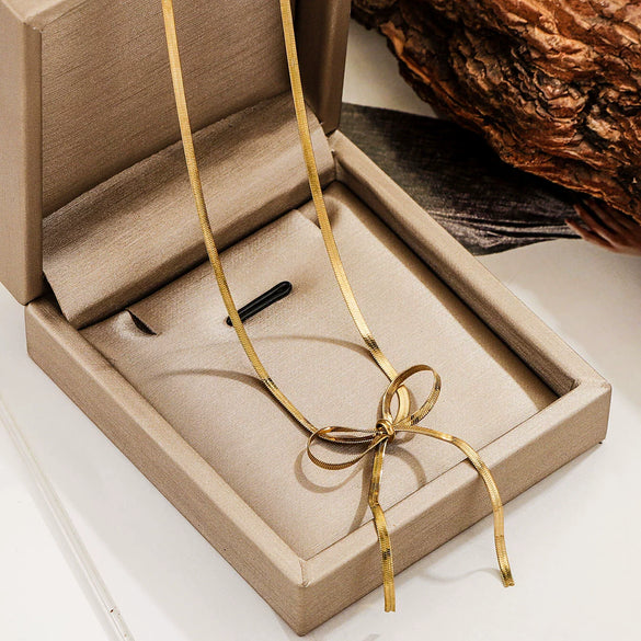Wholesale Titanium Steel Bow Snake Bone Chain Necklace With Electroplating For Women And Men