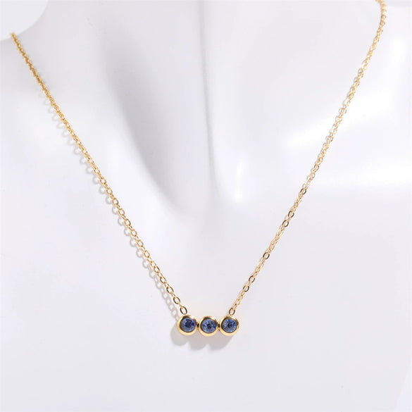 Wholesale Titanium Steel Electroplated Geometric Three Round Zircon Inlaid Birthday Stone Pendant Necklace For Women