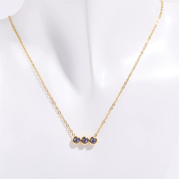 Wholesale Titanium Steel Electroplated Geometric Three Round Zircon Inlaid Birthday Stone Pendant Necklace For Women